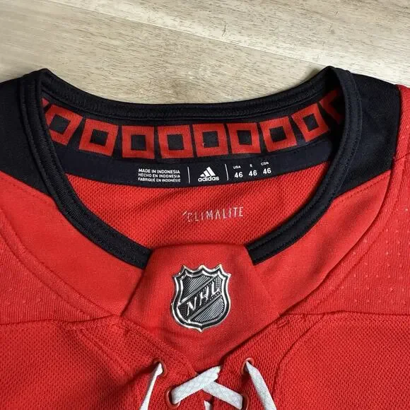 NWT Authentic Adidas NHL Jersey Size 46/S Carolina Hurricanes Home